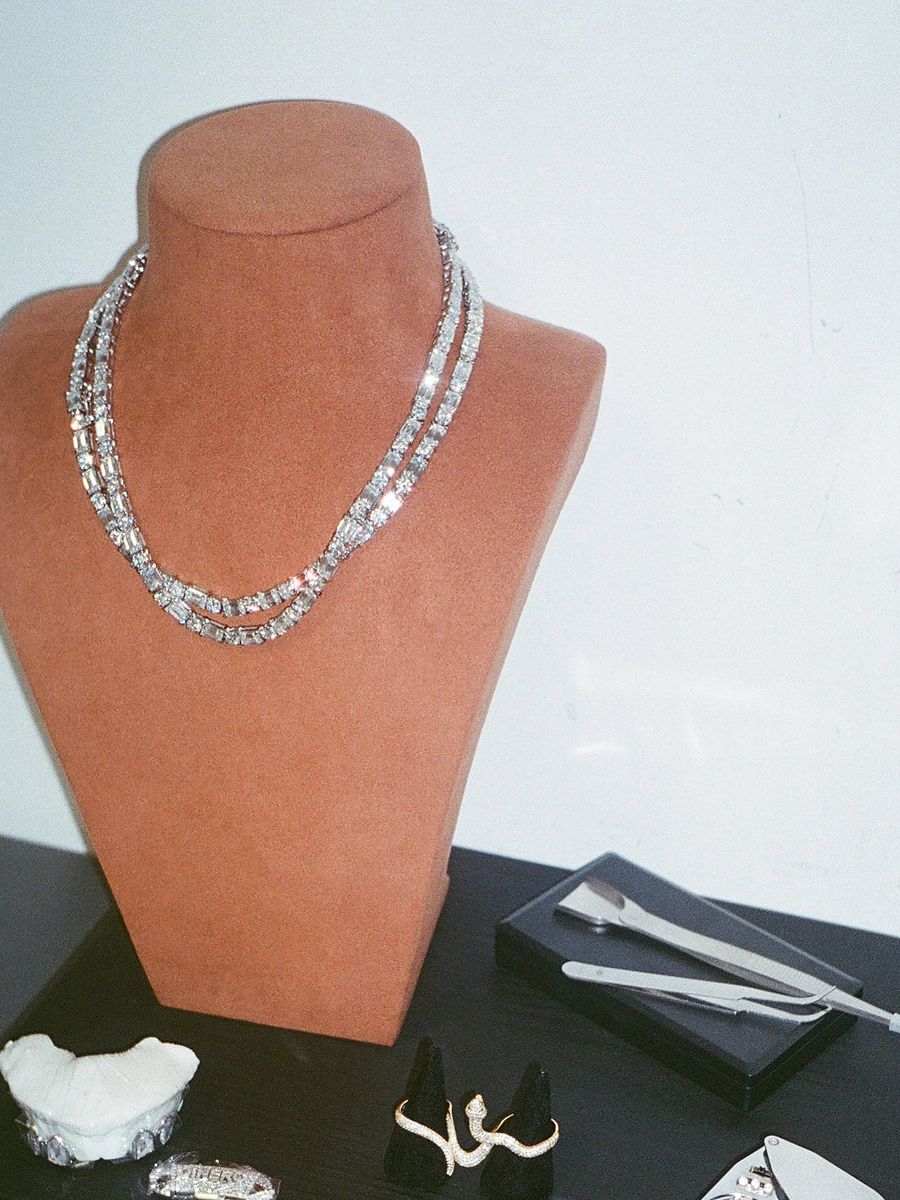 Iced London — tennis necklaces on a bust